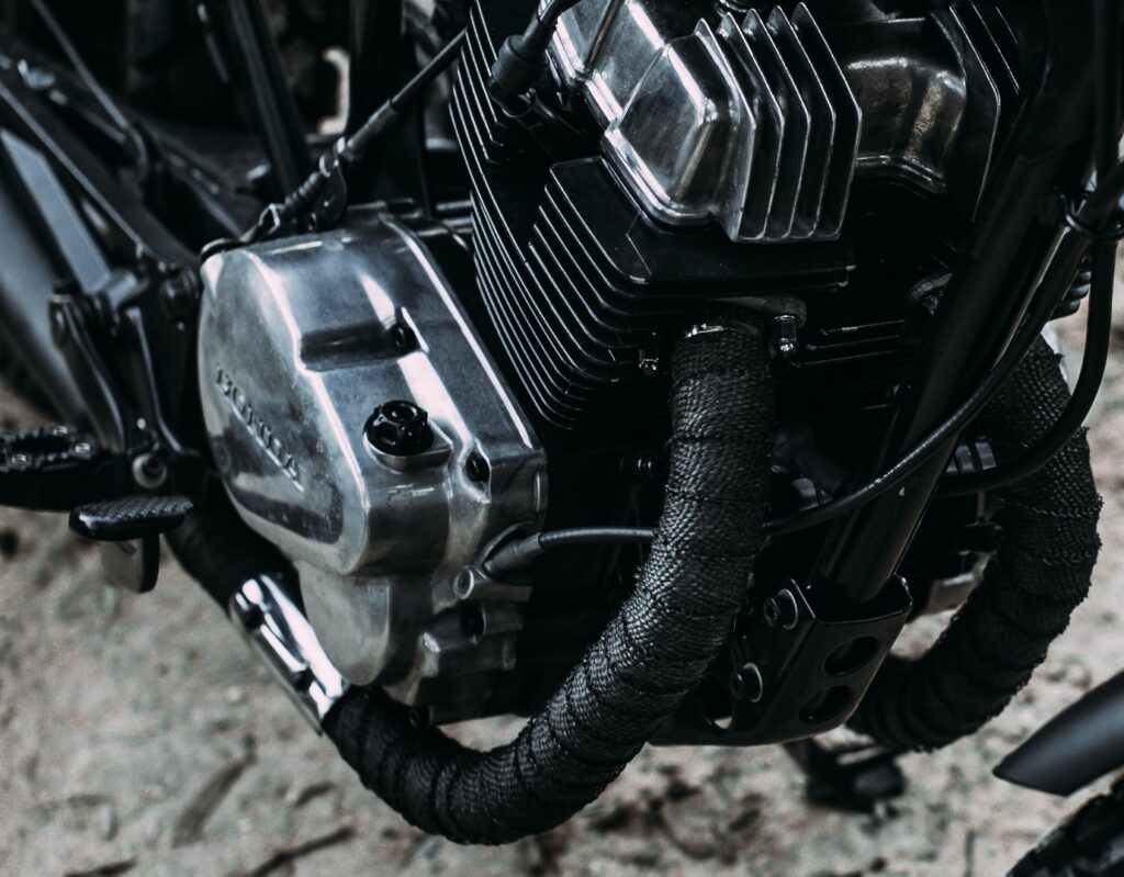 Motorcycle engine and the exhaust wrapped
