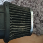 Air filter with oil coating