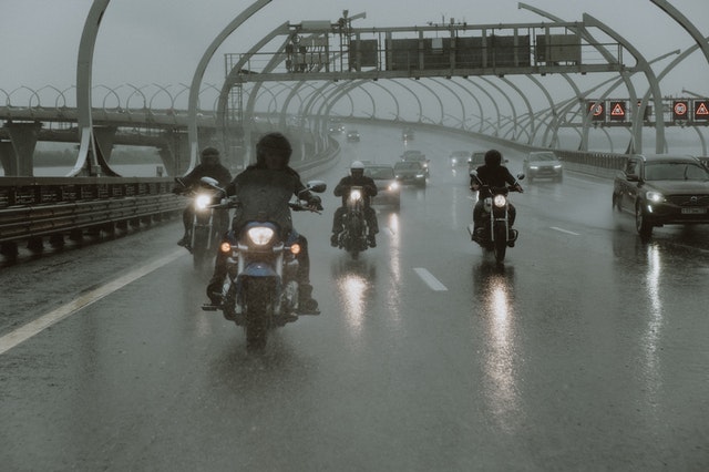 Motorcycle riding in rain
