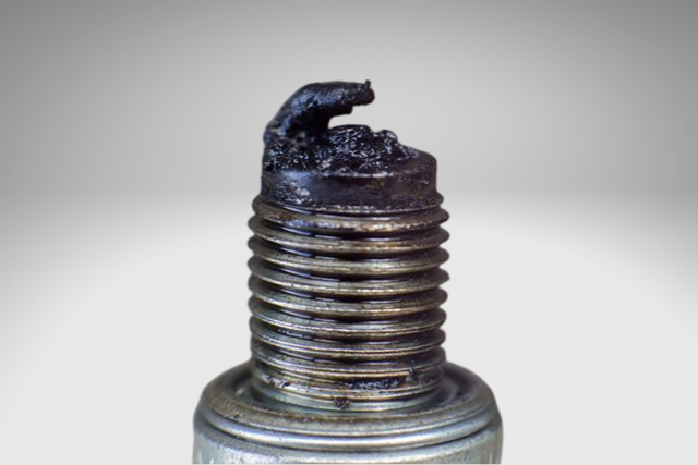 Oil fouling on spark plug