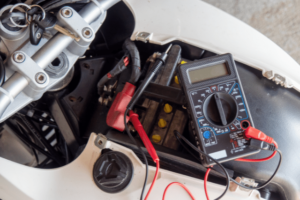 Motorcycle battery with multimeter