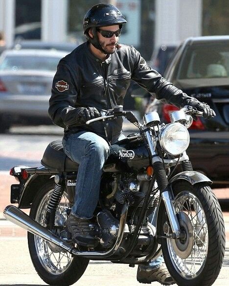 Keanu Reeves riding Norton Commando motorcycle
