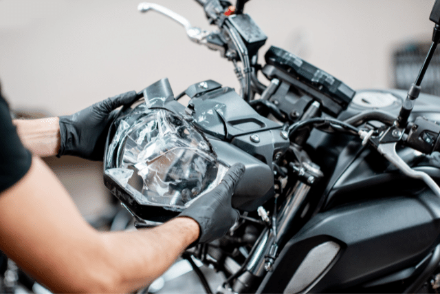 Motorcycle headlight with broken glass