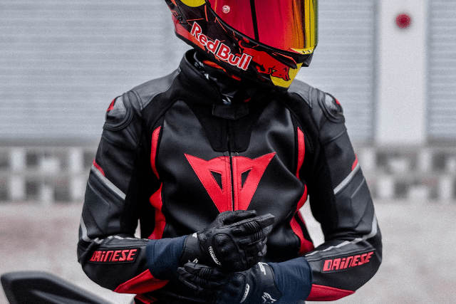 Motorcycle rider in gear - with helmet and gloves