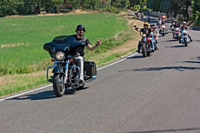 Motorcycle rider waving