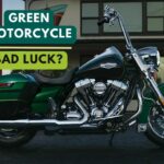 Green motorcycle bad luck - green harley davidson on the road parked