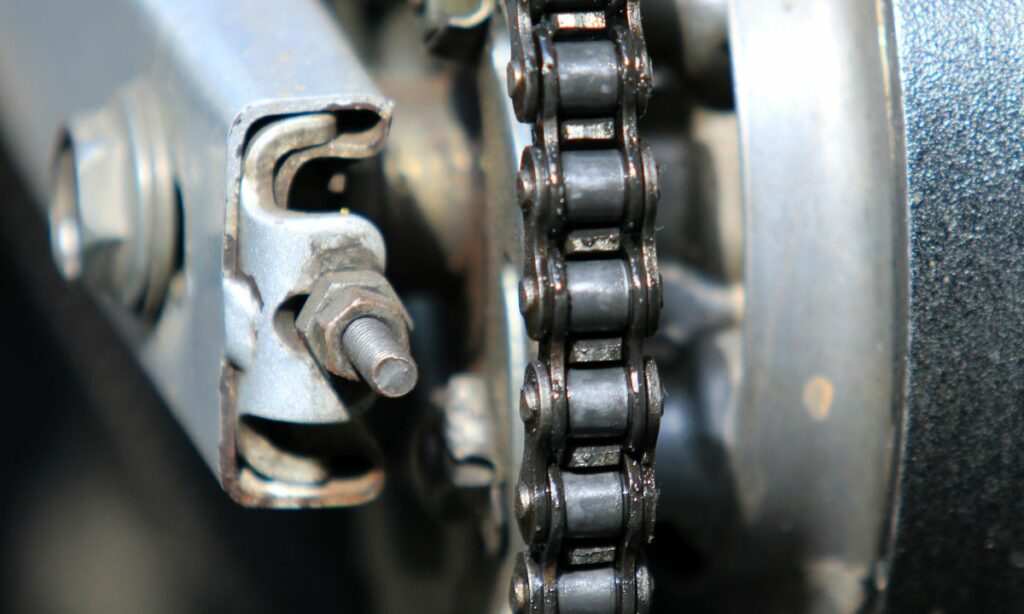 Motorcycle Adjuster bolt to tighten to loosen the chain