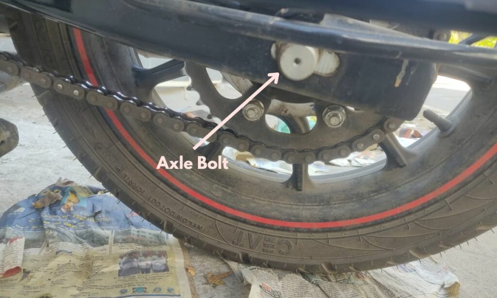 Motorcycle Axle bolt on the chain side of the rear wheel