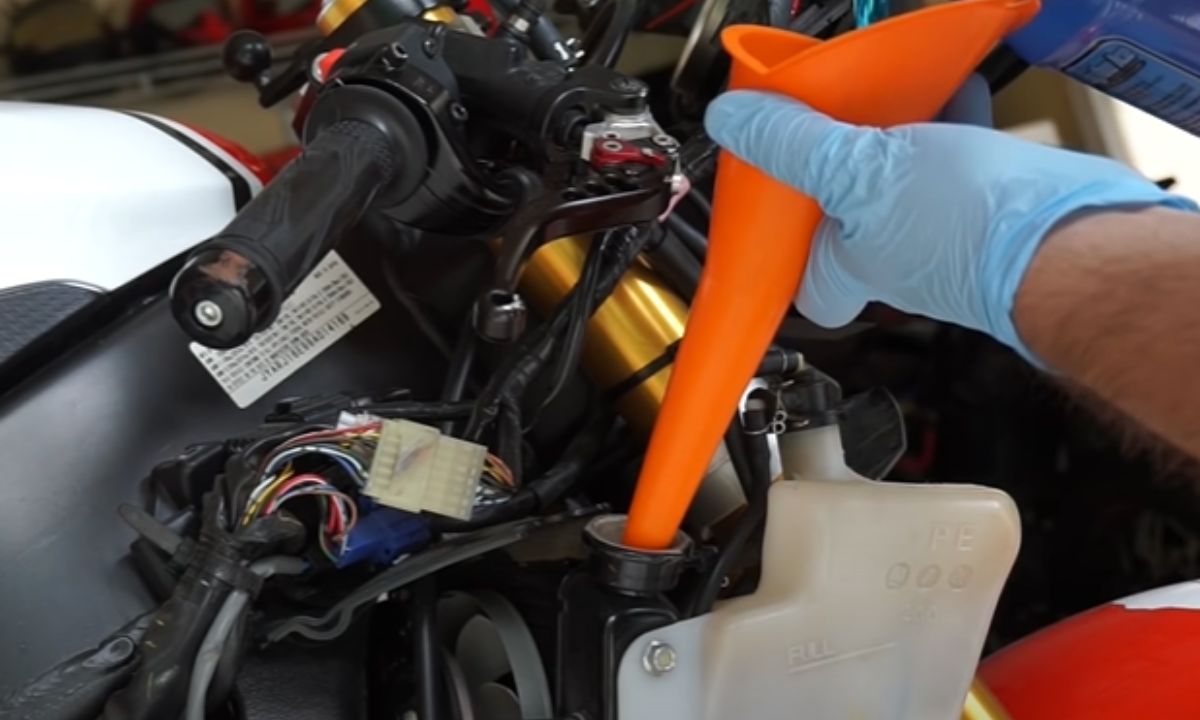 Filling coolant to the motorcycle radiator