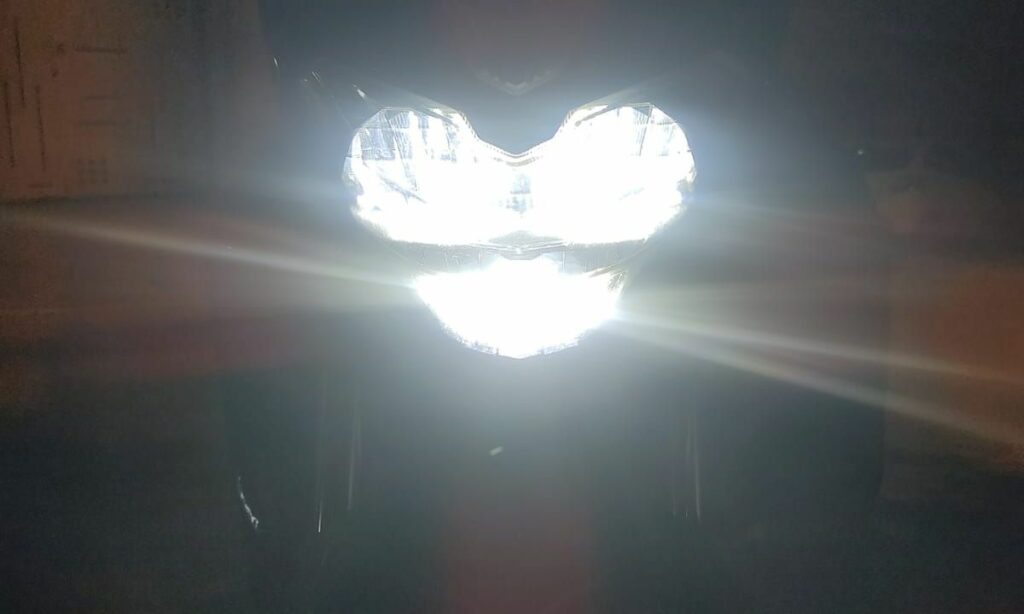 Motorcycle headlight with both low and high beam ON