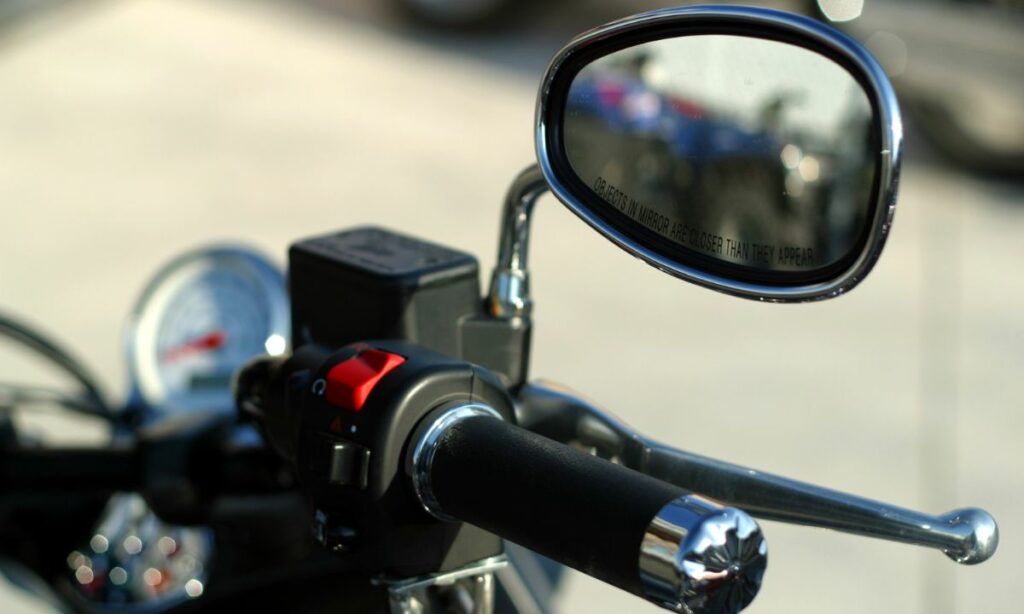 Motorcycle handlebar and rear view mirror