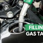 Filling motorcycle gas tank
