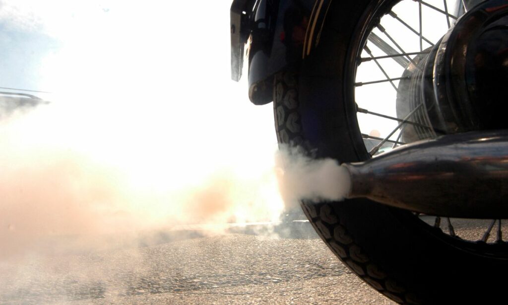 White smoke coming from a motorcycle exhaust