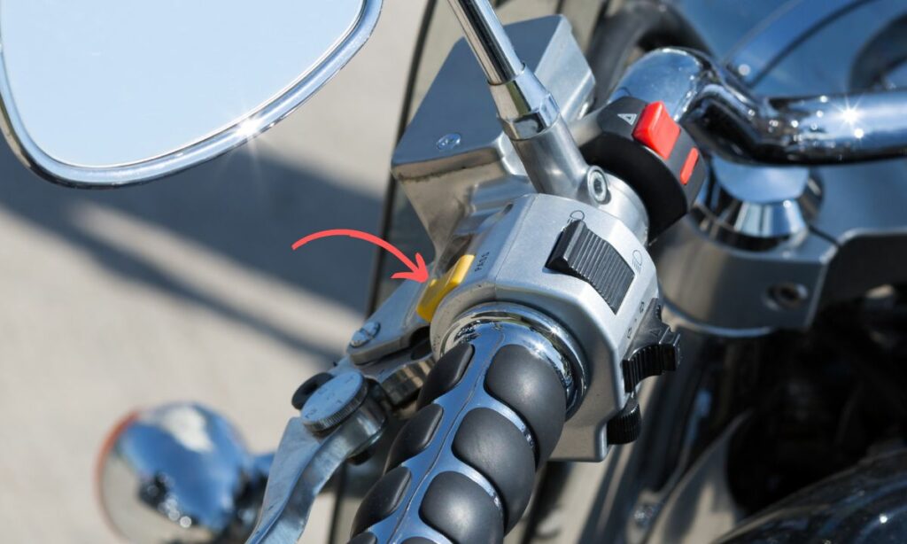 Motorcycle pass light switch on its left side of handlebar