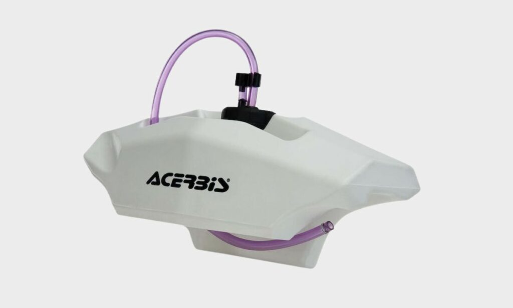 Auxiliary fuel tank for motorcycles