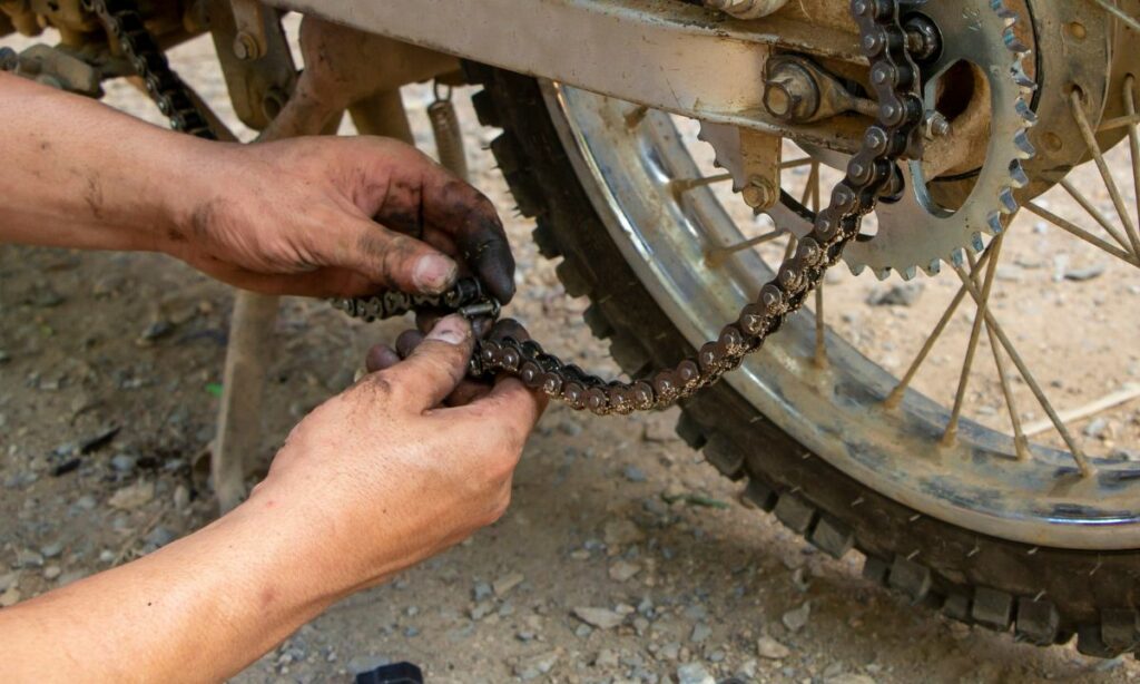 Motorcycle chain loosened and coming off the sprocket