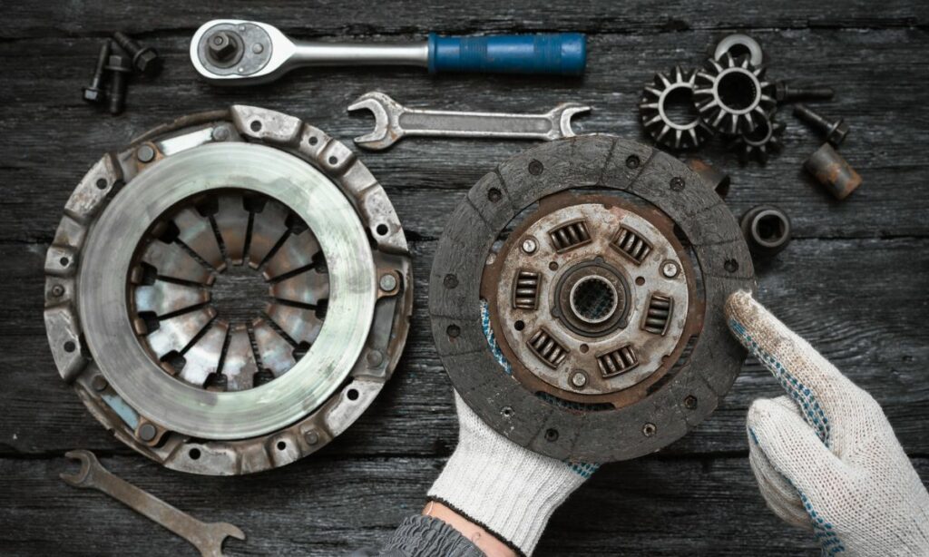 Motorcycle clutch plate dismantled with tools