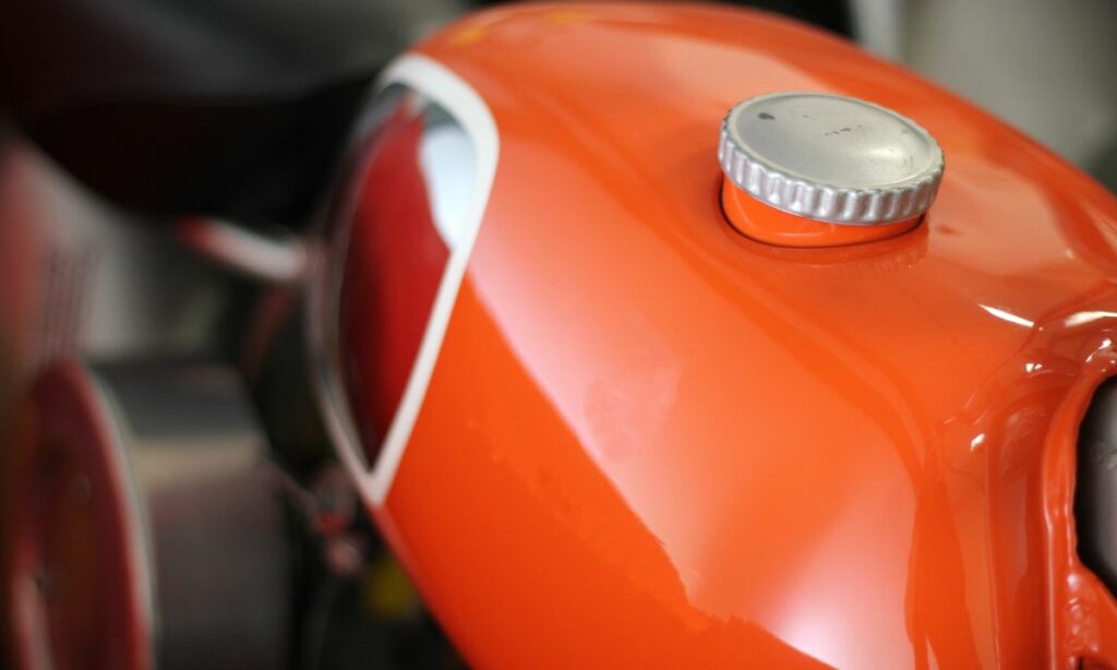 Motorcycle gas tank - orange in color