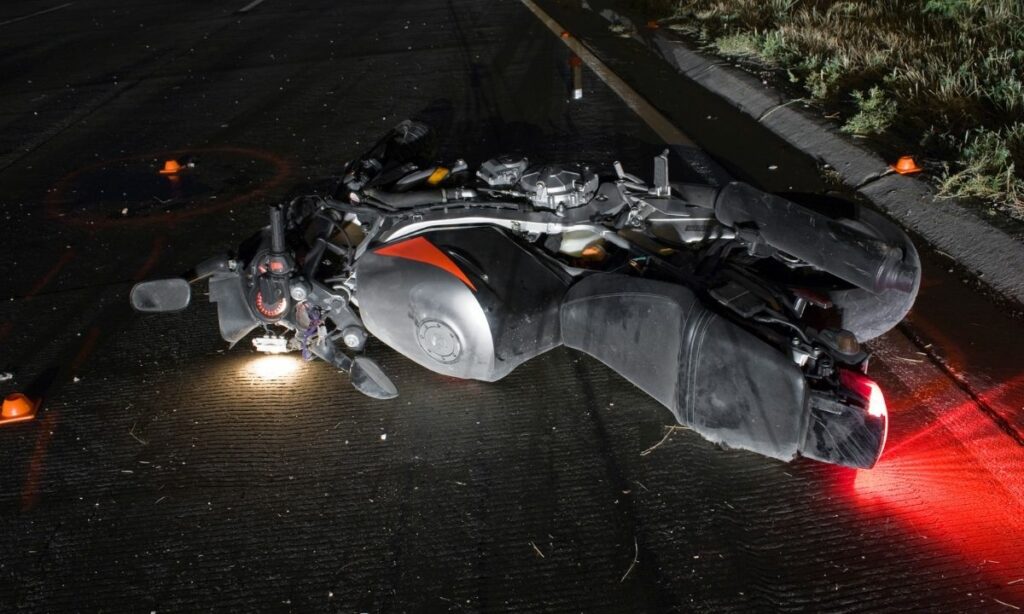 Motorcycle fallen down at night