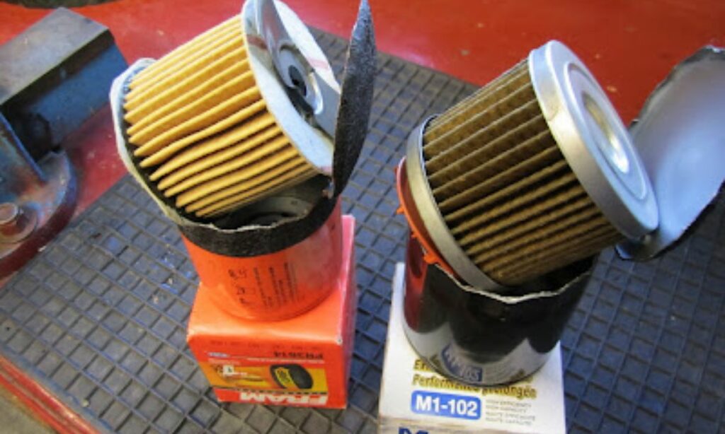 2 oil filters with their paper pleats - one filter is clogged